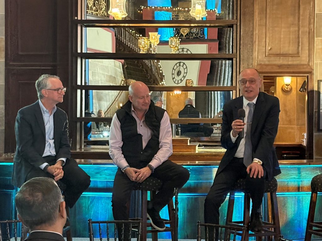 Yale Vice Provost for Research Michael Crair, state DECD Commissioner Daniel O'Keefe, and UConn interim Provost Pamir Alpay discuss Connecticut's quantum ecosystem during a conference on May 7.